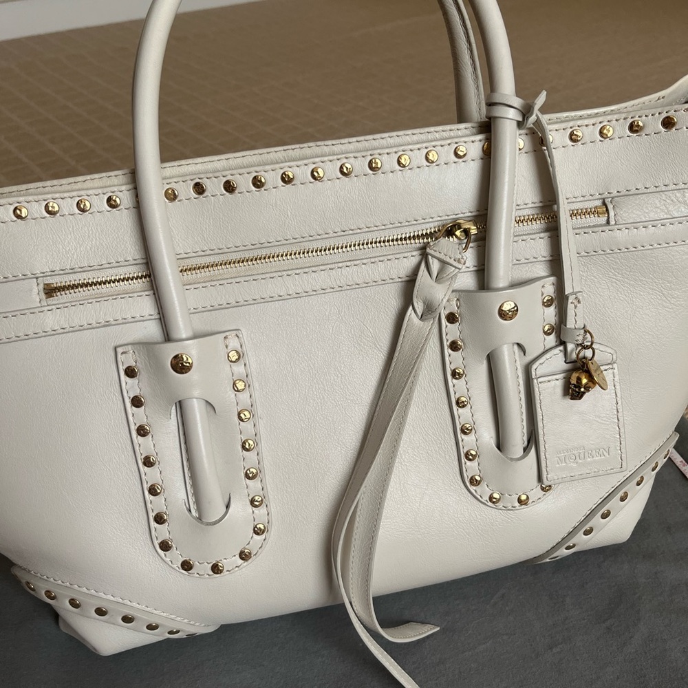 Alexander McQueen bag with top zip.